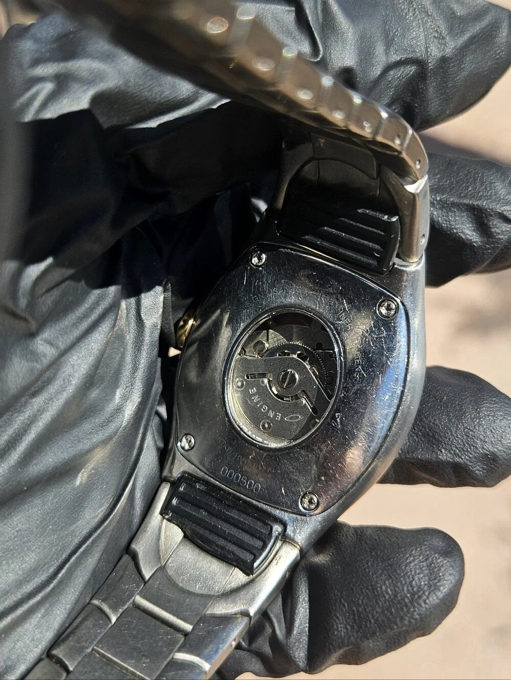 Oakley Timebomb Icon Titanium Watch with Gold Dial.